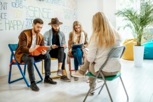 Group of people during the psychological therapy indoors