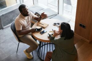 Two Business People in Cafe High Angle